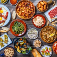 assorted tapas from spain food, typical spanish recipes, and pintxos on a rustic wood - food stock pictures, royalty-free photos & images