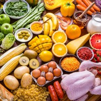 assortment of various kinds of food types arranged in a rainbow gradient background - food stock pictures, royalty-free photos & images