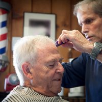 at the barber - hairstyle stock pictures, royalty-free photos & images