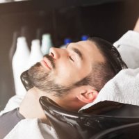 at the hairdresser washing hair - hairstyle stock pictures, royalty-free photos & images