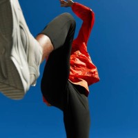athlete running against clear blue sky on sunny day - fashion stock pictures, royalty-free photos & images