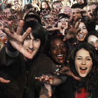 audience at concert reaching hands forward, smiling - concert stock pictures, royalty-free photos & images