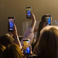 Audience during Roberto Carlos concert with cell phones recording and live with facebook live, instagram, igtv, snapchat and tiktok at Vibra Sao...