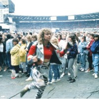 Audience gather outside the Wembley arena prior to the Michael Jackson concert, 15th July 1988.