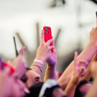Audience with cell phones and smartphones during 'Ensaios de Carnaval da Anitta' show at Memorial da America Latina on February 4, 2024 in Sao Paulo,...