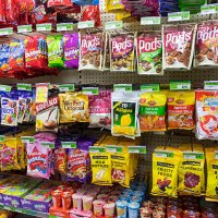 Australia, Victoria Melbourne Carlton Parkville University of Melbourne campus school Union House convenience store food shelves sale junk candy.