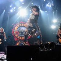 Axl Rose of Guns N' Roses performs onstage during the 