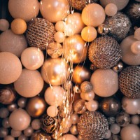 background made with abundance of christmas balls, festive toys and baubles. christmas lights, garland and illumination. concept of christmas or new year party celebration. - home decoration stock pictures, royalty-free photo