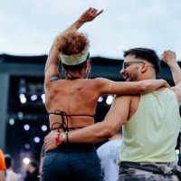 backshot of couple dancing at concert. - concert stock pictures, royalty-free photos & images
