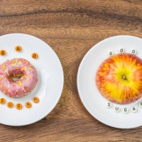 bad sugar and good sugar. medical concept - junk food stockfoto's en -beelden