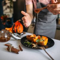 baked pumpkin, decorating holiday sweet on a plate. - food stock pictures, royalty-free photos & images