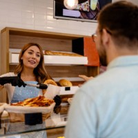 bakery's excellent customer engagement - junk food stock pictures, royalty-free photos & images