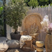 bali style peacock chair garden outdoor lounge in boho bamboo style with natural material and linen - garden decoration stock pictures, royalty-free photos & images