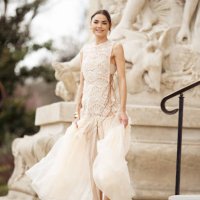 Bambi Noorthwood wears beige dress and brown leather shooe outside the Zimmermann fashion show during the Womenswear Fall/Winter 2025/2026 as part of...