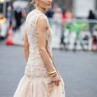 Bambi Northwood Blyth wears beige laced sleeveless dress, golden bracelet outside Zimmermann during the Womenswear Fall/Winter 2025/2026 as part of...
