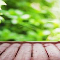 bamboo table on blur nature background - garden decoration photos et images de collection