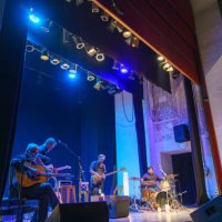 band of four musicians playing on stage - concert stock pictures, royalty-free photos & images