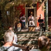 band of mature people playing music and singing outdoors - concert stock pictures, royalty-free photos & images
