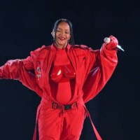 Barbadian singer Rihanna performs during the halftime show of Super Bowl LVII between the Kansas City Chiefs and the Philadelphia Eagles at State...