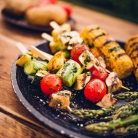 barbecue grilled vegetable kebabs, corn and asparagus on a plate - food stock pictures, royalty-free photos & images