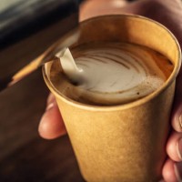 barista pouring milk in cappuccino coffee in coffeeshop. - junk food stock pictures, royalty-free photos & images