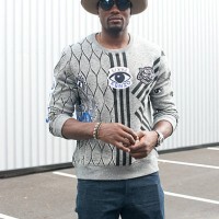Basketball player Serge Ibaka wears Kenzo jumper and Prada sunglasses on day 4 of Paris Fashion Week Menswear Spring/Summer 2016 on June 25, 2015 in...