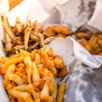 baskets of fresh fried fish - junk food stock pictures, royalty-free photos & images