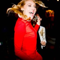beautiful blond woman dancing by friends at back yard during garden party - fashion stock pictures, royalty-free photos & images
