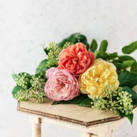 beautiful bouquet of colorful english roses with ivy blossom on a wooden vintage stool. - garden decoration stock pictures, royalty-free photos & images