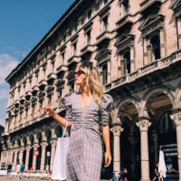 beautiful businesswoman with sunglasses looking away while walking on the street - fashion stock pictures, royalty-free photos & images