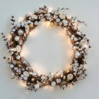 beautiful christmas wreath with burning garland hanging on the white wall. - home decoration stock pictures, royalty-free photos & images