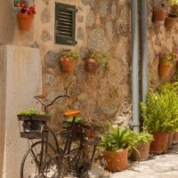 beautiful courtyard decorated with flower pots and ceramic tiles in valdemossa, majorka island, spain. - garden decoration stock pictures, royalty-free photos & images