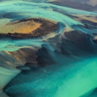 beautiful emerald-colored glacial rivers of iceland, taken from a helicopter - travel stock pictures, royalty-free photos & images