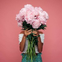beautiful emotional woman holding bouquet of flowers - fashion stock pictures, royalty-free photos & images