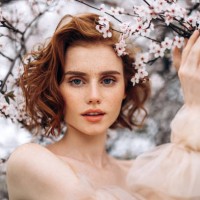 beautiful girl on the background of spring bush - fashion stock pictures, royalty-free photos & images