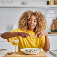 beautiful girl taking a picture of a plate - food stock pictures, royalty-free photos & images