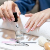 beautiful manicured woman's nails with cream nail - nails art stock pictures, royalty-free photos & images