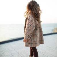beautiful toddler girl with long hair in wool blazer posing outdoor. - fashion stock pictures, royalty-free photos & images
