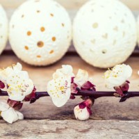 beautiful unique easter eggs on wooden background - garden decoration stock pictures, royalty-free photos & images