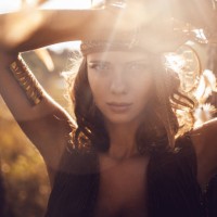 beautiful wild girl portrait in golden sun flare - fashion stock pictures, royalty-free photos & images