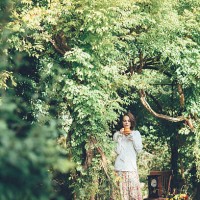 beautiful woman drinking tea in a magical park - garden decoration stock pictures, royalty-free photos & images