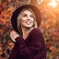 beautiful woman enjoying in a sunny autumn day - fashion stock pictures, royalty-free photos & images