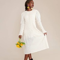 beautiful woman holding sunflowers - fashion stock pictures, royalty-free photos & images