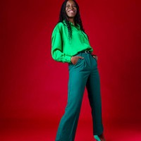 beautiful woman wearing green outfit - fashion stock pictures, royalty-free photos & images