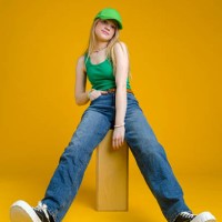 beautiful woman wearing jeans and tank top - fashion stock pictures, royalty-free photos & images