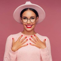 beautiful woman wearing pink hat - fashion stock pictures, royalty-free photos & images
