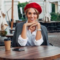 beautiful woman wearing red beret drinking coffee - fashion stock pictures, royalty-free photos & images