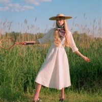 beautiful young woman near lake - fashion stock-fotos und bilder