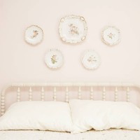 bedroom with porcelain hanging on wall above bed - home decoration stock pictures, royalty-free photos & images