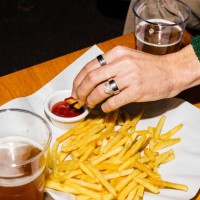 beers and french fries - fashion stock pictures, royalty-free photos & images